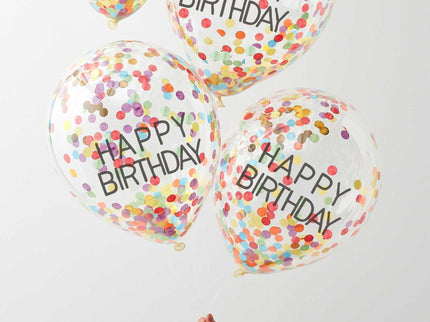 Nušvieskite gimtadienį šiais vaivorykštiniais konfeti balionais ir sukurkite nuostabiai spalvingą vakarėlį! Skaidrūs balionai su užrašu "Happy Birthday" pripildyti spalvotų konfeti gabalėlių! Kad konfeti geriausiai priliptų prie balionų šonų, rekomenduojame vaivorykštinius balionus pripūsti helio ir oro mišiniu! Kiekvienoje pakuotėje yra 5x 12 colių (30 cm) balionai.