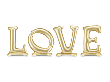 Pastatomas folinis balionas „LOVE“, auksinis. Satininio paviršiaus. Dydis nepripūtus – apie 350 x 114 cm, pripūtus 300 x 97 cm. Skirtas pildyti oru. Komplekte pridedamas šiaudelis. Puikiai tinka kaip šventės akcentas ar foto siena.