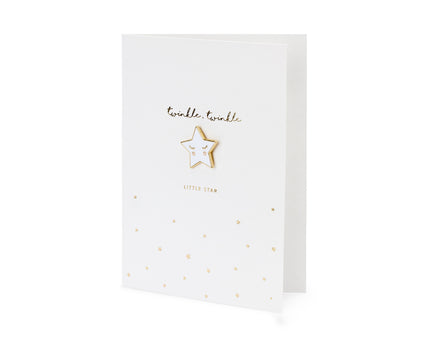 Baltos spalvos atvirukas su aukso spalvos metaliniu atspaudu bei užrašu "twinkle twinkle little star". Rinkinyje taip pat yra žvaigždės formos emaliuotas ženkliukas ir baltas vokas su aukso spalvos metaliniu atspaudu. Atviruko dydis apie 10.5 x 14.8 cm, emaliuoto ženkliuko dydis apie 2.5 x 2.5 cm.