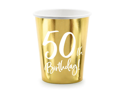 Metalinės aukso spalvos popieriniai puodeliai su baltu užrašu "50th Birthday!", talpinantys iki apie 220 ml. 